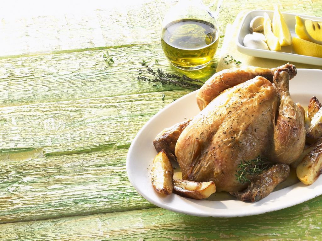 Hähnchen auf mediterrane Art mit Zitrone, Thymian und Olivenöl Rezept ...