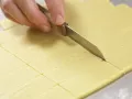 Orangenblätter, Nugatstreifen und Kokosringe Zubereitung Schritt 6 Orangenblätter, Nugatstreifen und Kokosringe Zubereitung Schritt 6