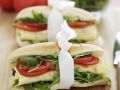 Baguette-Sandwich mit Rucola, Tomaten und Ei Rezept