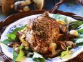 Braten vom Schwein mit Pilzen, Zitrone und Knoblauch Rezept