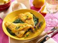 Fisch in Eihülle auf Spinat Rezept