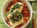 Fischfilet auf Tomaten gebacken Rezept