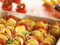Gebackene Kartoffeln mit Tomaten Rezept