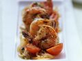 Gebratene Garnelen mit Tomaten und Zwiebeln Rezept