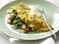 Gefülltes Omelett mit Tomaten, Pilzen und Schafskäse Rezept