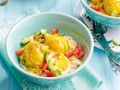 Gekochte Eier mit Curry-Kokos-Sauce auf Reis Rezept