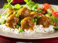 Hackklößchen mit Currysoße und Reis Rezept