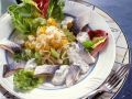 Hering mit Sauerkrautsalat und Gemüse Rezept