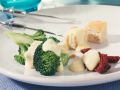 Käsefondue mit mariniertem Brokkoli und getrockneten Tomaten Rezept