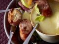 Käsefondue mit Wurststücken Rezept