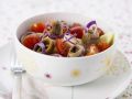 Kartoffelsalat mit Sardellen, Tomaten und Zwiebeln Rezept