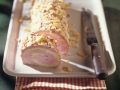 Kirsch-Buttercreme-Roulade mit Mandeln Rezept
