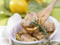 Mit Zitrone und Rosmarin mariniertes Kalbsschnitzel Rezept