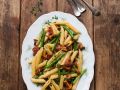 Penne mit Bohnen, Pilzen und Speck Rezept