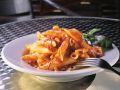 Penne mit Speck-Tomatensauce Rezept