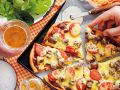 Pizza mit Bratwurst und Käse Rezept