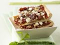 Pizza mit getrockneten Tomaten Rezept
