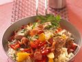 Reispfanne mit Paprika, Fleisch und Speck Rezept