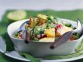 Reissalat mit Erbsen, Obst und Curry Rezept