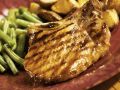 Schweinekotelett mit grünen Bohnen und Bratkartoffeln Rezept