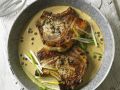 Schweinekoteletts in sahniger Pfeffersoße Rezept
