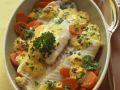 Seelachsfilets auf Karottengemüse mit Senfsoße Rezept