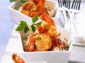 Shrimps mit Cognac-Tomaten-Soße und Reis Rezept