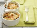Spinatgratin mit Käse und Mandeln Rezept