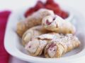 Süße Röllchen mit Ricotta und Himbeer Rezept
