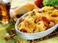 Tortellini-Schinken-Gratin mit Pilzen Rezept