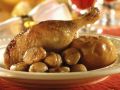 Weihnachtsgans mit glasierten Maroni und Bratapfel Rezept