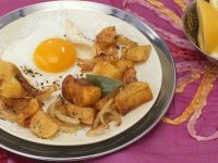 Bratkartoffeln mit indischen Gewürzen und Spiegelei Rezept