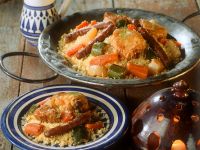 Deftiger Couscous mit Fleisch und Gemüse Deftiger Couscous mit Fleisch und Gemüse