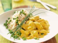 Geflügelcurry mit Erbsen und Reis Rezept