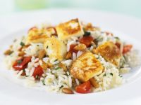 Hähnchen auf Reis mit Tomaten Rezept