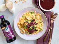 Kräuter-Hirsotto mit gebratenen Kräuterseitlingen und Aroniasauce Rezept