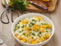 Kürbis-Risotto mit Erbsen Rezept