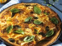 Kürbisquiche mit Feta und Zwiebeln Rezept