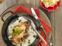 Schweinekotelett mit Äpfeln überbacken Schweinekotelett mit Äpfeln überbacken