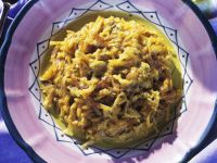 Stockfisch mit Zwiebeln, Ei und Kartoffeln Stockfisch mit Zwiebeln, Ei und Kartoffeln