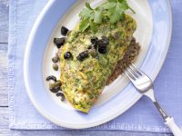 Tomaten-Omelett auf Kürbiskernbrot Rezept