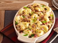 Tortellini-Auflauf mit Schinken und Frühlingszwiebeln Rezept