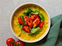 Zucchini-Porridge mit Tomaten Rezept