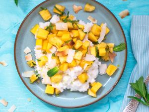 Limetten-Kokos-Milchreis mit Mango-Ananas-Salat und Minze Rezept