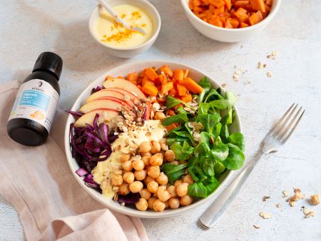 Good-Life-Bowl mit Süßkartoffeln, Kichererbsen und Kurkuma-Algenöl-Sauce