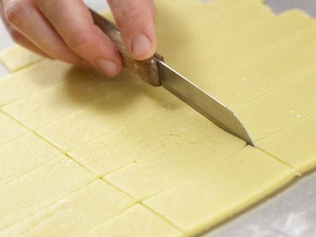 Orangenblätter, Nugatstreifen und Kokosringe Zubereitung Schritt 6 Orangenblätter, Nugatstreifen und Kokosringe Zubereitung Schritt 6