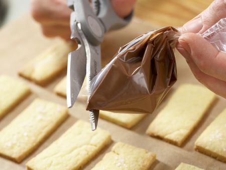 Orangenblätter, Nugatstreifen und Kokosringe Zubereitung Schritt 7 Orangenblätter, Nugatstreifen und Kokosringe Zubereitung Schritt 7