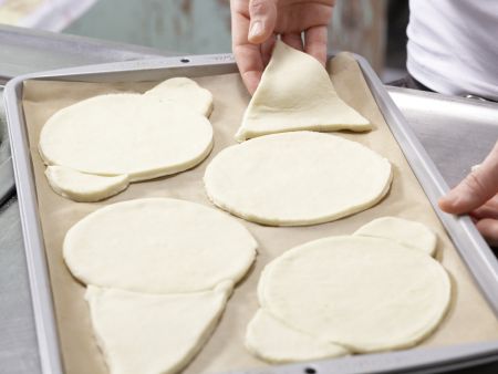 Pizza-Gesichter Zubereitung Schritt 7 Pizza-Gesichter Zubereitung Schritt 7