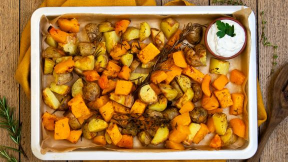 Kürbis und Kartoffeln im Ofen