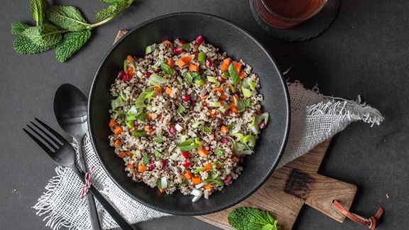 Colorful quinoa salad with spring onions
